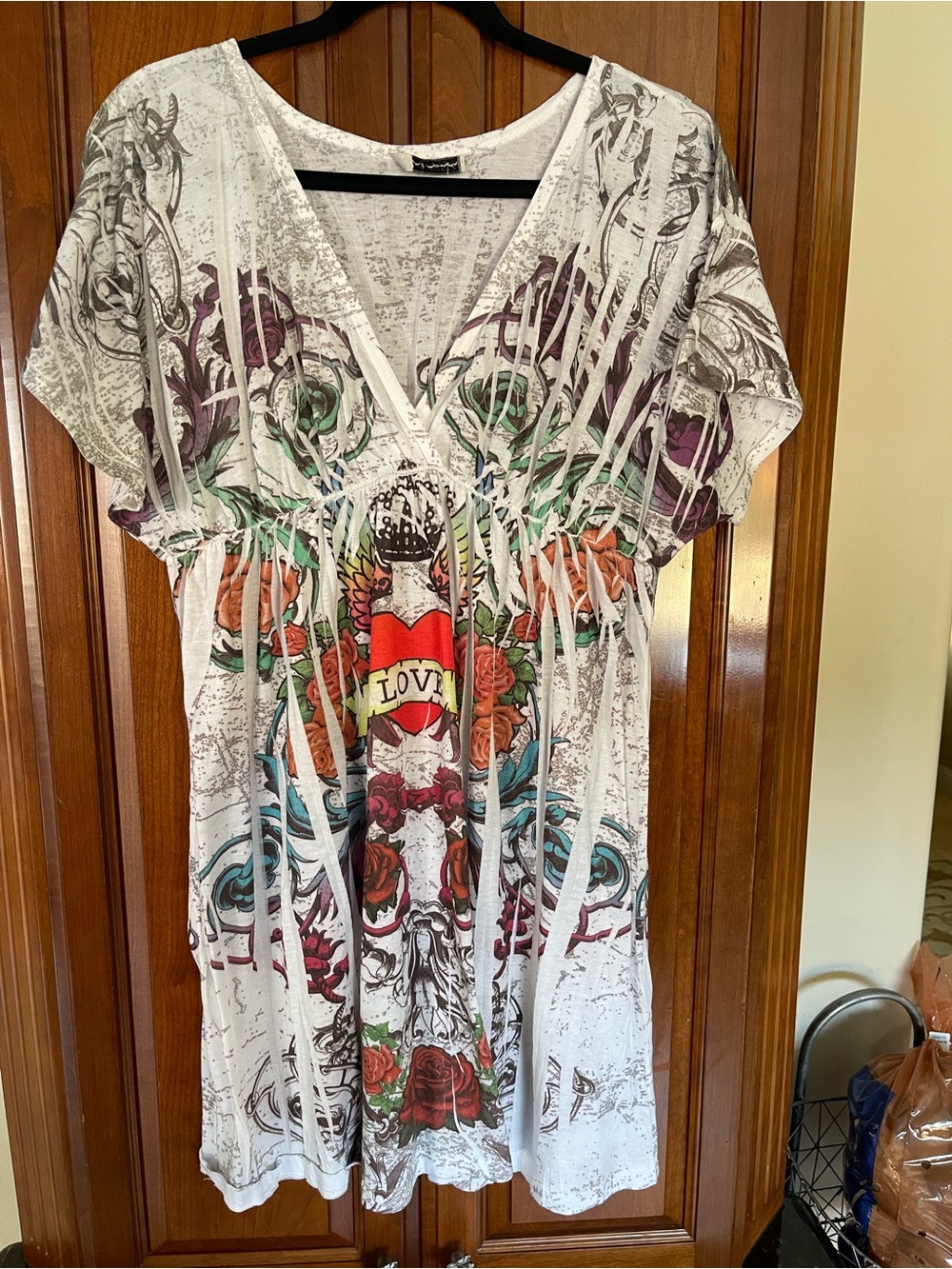 White V‑Neck Mini Dress with Colorful Floral Skull Motif